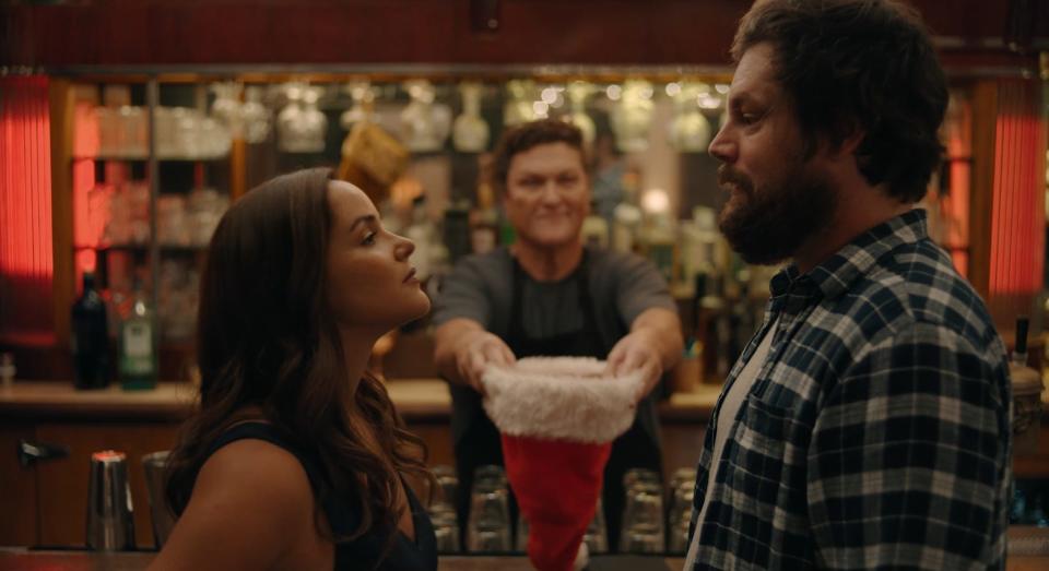 Nina (Melissa Fumero, left) and Allen (Luka Jones) break up and split everything in their lives but go to war – with much beer involved – for custody of their favorite watering hole in "Bar Fight!"