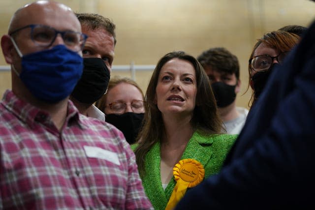 Sarah Green (centre) took the previously safe Tory seat for the Lib Dems (Yui Mok/PA)