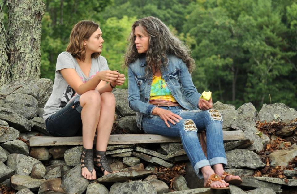 This image released by IFC Films shows Elizabeth Olsen, left, and Jane Fonda in a scene from "Peace Love and Misunderstanding." (AP Photo/IFC Films)