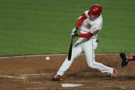 Cincinnati Reds' Shogo Akiyama hits a single during the fourth inning of the team's baseball game against the Chicago White Sox in Cincinnati, Friday, Sept. 18, 2020. (AP Photo/Aaron Doster)