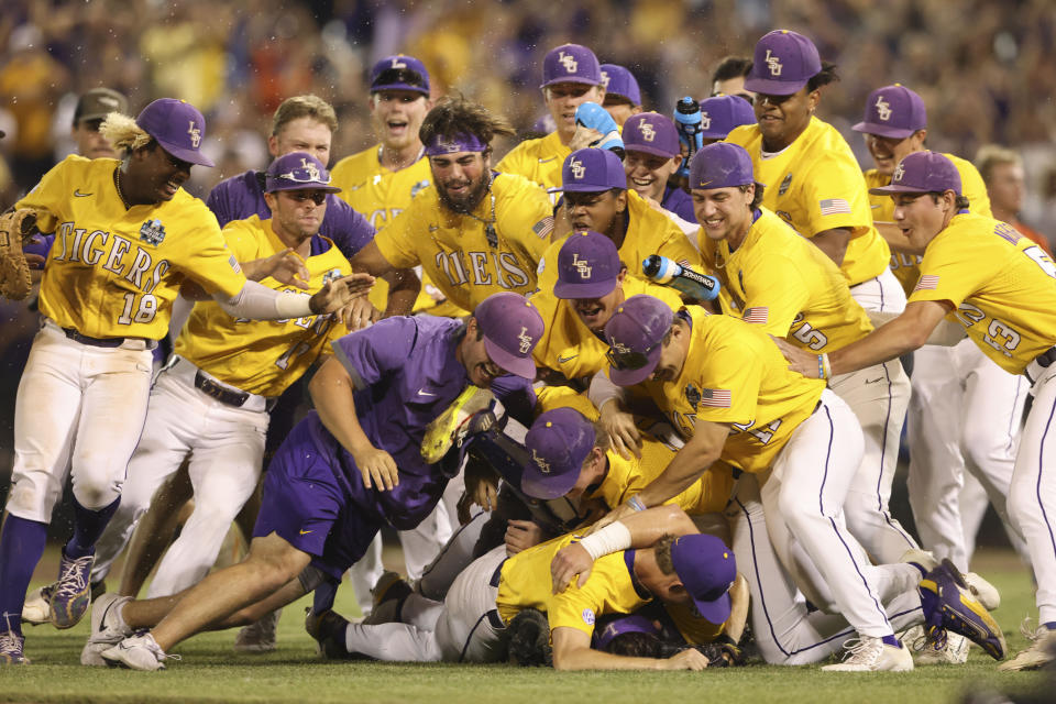 LSU celebrates after defeating Florida in Game 3 of the NCAA College World Series baseball finals in Omaha, Neb., Monday, June 26, 2023. LSU won the national championship 18-4. (AP Photo/Rebecca S. Gratz)
