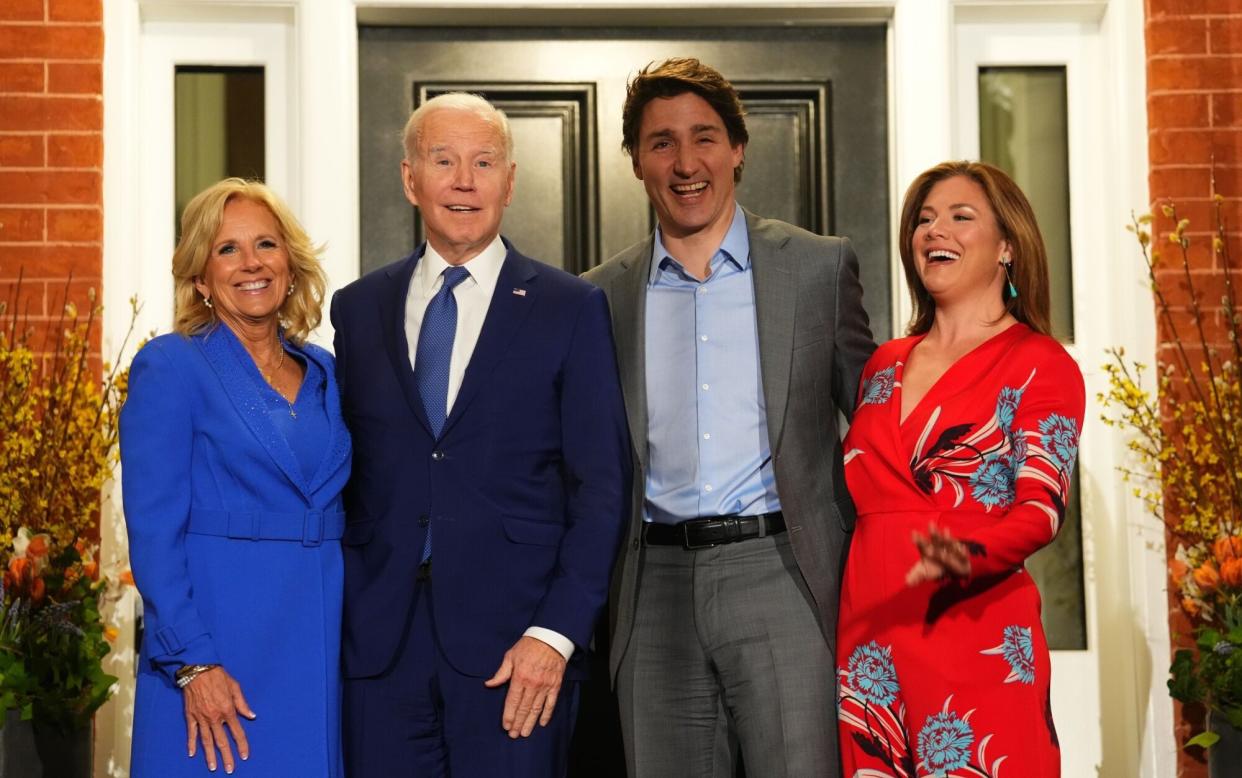 President Joe Biden with his wife, Jill, and Prime Minister Justin Trudeau with his wife, Sophie, at Rideau Cottage in Ottawa on Thursday night - BLOOMBERG