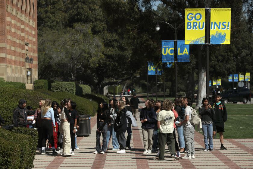 LOS ANGELES-CA-MARCH 28, 2023: A tour passes by Royce Hall at UCLA on March 23, 2023. (Christina House / Los Angeles Times)