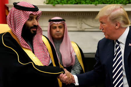 U.S. President Donald Trump shakes hands with Saudi Arabia's Crown Prince Mohammed bin Salman in the Oval Office at the White House in Washington, U.S. March 20, 2018. REUTERS/Jonathan Ernst