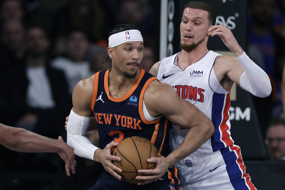 New York Knicks guard Josh Hart (3) drives to the basket against Detroit Pistons guard Malachi Flynn during the first half of an NBA basketball game Monday, Feb. 26, 2024, in New York. (AP Photo/Adam Hunger)