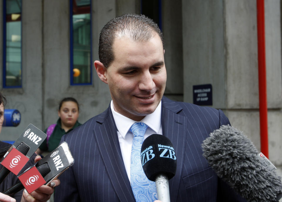 New Zealand's former lawmaker Jami-Lee Ross talks to reporters outside Wellington Central Police Station in Wellington, New Zealand Wednesday, Oct. 17, 2018. Ross secretly recorded New Zealand's opposition leader Simon Bridges making inappropriate remarks as turmoil in the conservative National Party escalated on Wednesday. (AP Photo/Nick Perry)