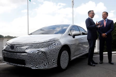 President of Toyota in Brazil, Rafael Chang, gestures next to the governor of Brazil's Sao Paulo state Joao Doria, as he announces a Brazilian vehicle which is equipped with the hybrid technology during a news conference in Sao Paulo