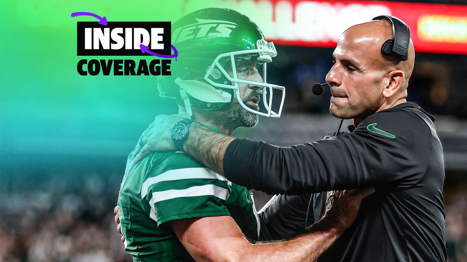 New York Jets quarterback Aaron Rodgers (8) and head coach Robert Saleh during the first quarter of an NFL game against the New England Patriots, Thursday, Sept. 19, 2024, in East Rutherford, N.J. (AP Photo/Adam Hunger)