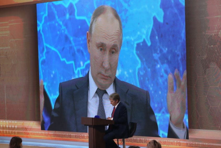 Dmitry Peskov and Vladimir Putin