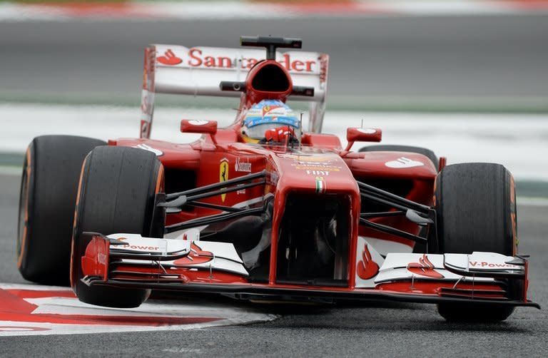 Ferrari's Spanish driver Fernando Alonso drives during the first practice session at the Circuit de Catalunya in Montmelo near Barcelona on May 10, 2013. World championship leader Sebastian Vettel and Alonso both played down the significance of their performances after they had dominated proceedings on the opening day of practice for this weekend's Spanish Grand Prix