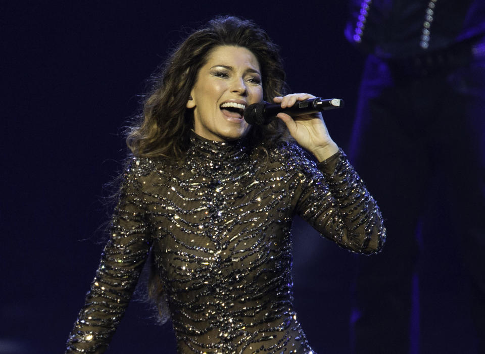 FILE - This Dec. 1, 2012 file photo shows Shania Twain performing at The Colosseum at Caesars Palace in Las Vegas. Twain has announced 22 new show dates this fall to round out the first year of her two-year Las Vegas Strip residency. Twain said, Monday, May 6, 2013, that the show at Caesars Palace is “a dream performance scenario” that allows her to balance her roles as a mother and as a country superstar. The 47-year-old Canadian singer known for “Any Man of Mine” and “That Don't Impress Me” made a grand entrance into Sin City on horseback and returned to the stage in December after nearly a decade in hiatus. (Photo by Eric Jamison/Invision/AP, file)