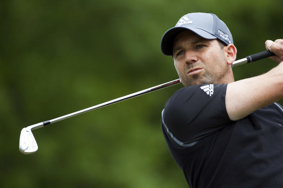 Sergio Garcia hits off the tee on the 10th hole during the third round of the Houston Open golf tournament, Saturday, April 5, 2014, in Humble, Texas. (AP Photo/Patric Schneider)