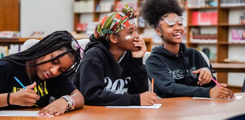 Northwest Middle School From left, Jaelah Sanders, Judely "Juju" Agenor, and Robyn Lyles write letters to their younger selves during a special session of Girls, Inc. on Thursday, April 18, 2024, at N.M.S in Indianapolis. Girls, Inc. is a national nonprofit that centers around providing programming for empowering young girls.