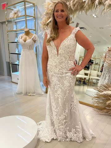 <p>Christine Brown/Instagram</p> Christine Brown models the dress she ended up wearing at her October 2023 wedding