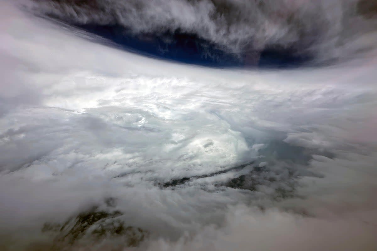 Typhoon Saola is seen from a fixed-wing weather-observing aircraft near Hong Kong on Friday (AP)