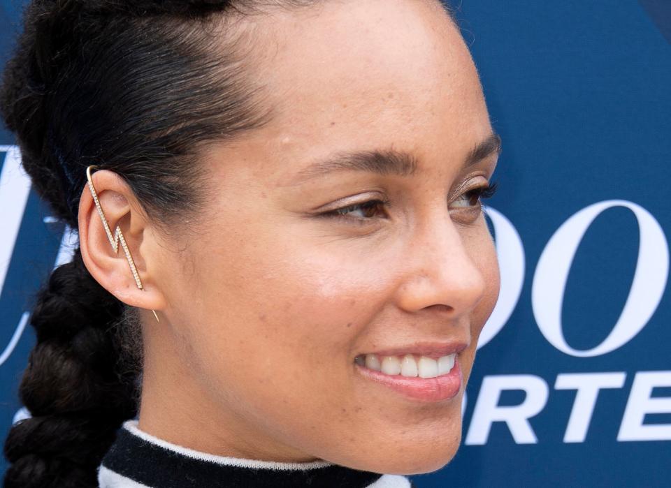 Singer-songwriter Alicia Keys wrote a 2016 essay in "<a href="https://www.lennyletter.com/story/alicia-keys-time-to-uncover" target="_blank" rel="noopener noreferrer">Lenny</a>" explaining her decision to go makeup-free. (VALERIE MACON via Getty Images)