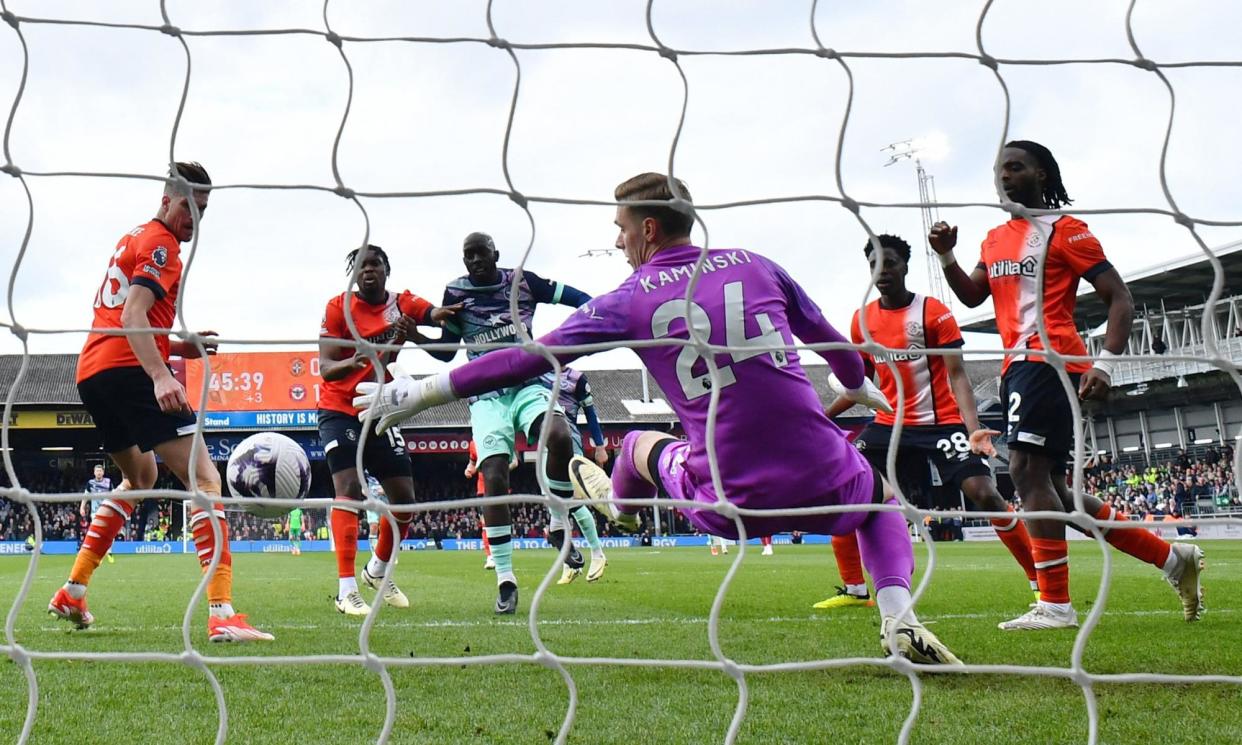 <span>Yoane Wissa scores Brentford’s second goal in the 5-1 victory over Luton Town. </span><span>Photograph: Dylan Martinez/Reuters</span>