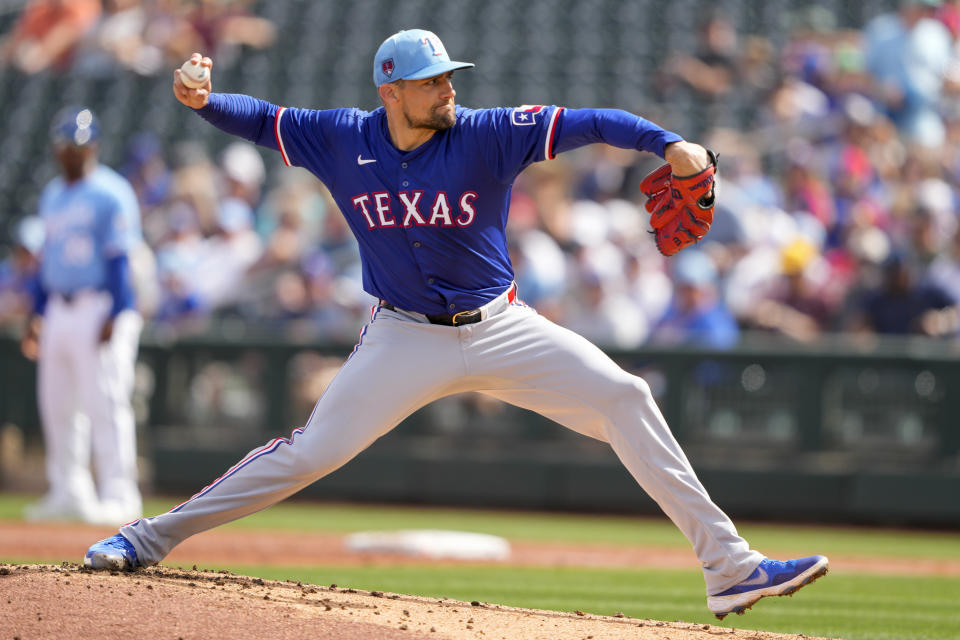 FILE - Texas Rangers starting pitcher Nathan Eovaldi throws against the Kansas City Royals during the first inning of a spring training baseball game Saturday, Feb. 24, 2024, in Surprise, Ariz. Since returning from a second Tommy John Surgery, Nathan Eovaldi is 41-27 and a two-time All-Star.(AP Photo/Lindsey Wasson, File)