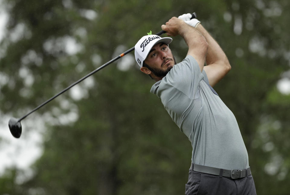 Max Homa watches his tee shot on the third hole during the final round of the Wells Fargo Championship golf tournament at Quail Hollow Club in Charlotte, N.C., Sunday, May 5, 2019. (AP Photo/Chuck Burton)