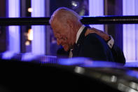 President Joe Biden and French President Emmanuel Macron depart after eating dinner at Fiola Mare in Washington, Wednesday, Nov. 30, 2022. (AP Photo/Andrew Harnik)