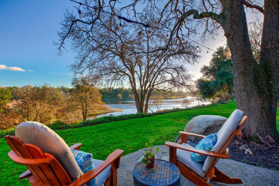 The Carmichael, California home sits above the American River at River Bend Park.