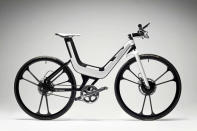 Looking like a two-wheeled track demon, Ford’s E-Bike Concept - emphasis for the moment on concept — was unveiled at this fall’s Frankfurt Auto Show. Featuring a featherweight 5.5-lb frame made of aluminum and carbon fiber, the E-Bike is driven by a motor hidden in the front wheel hub that’s powered by a lithium-ion battery tucked inside the frame. Ford claims the bike can seamlessly integrate human and battery power via an “integrated controller and magnetorestriction technology” derived from Formula One. Such lofty tech-talk aside, Ford’s foray into the electric bike market reflects a bigger trend as consumers look for both fuel-efficient and fuel-free ways to commute. Smart Car is set to sell an e-bike in dealerships soon, after unveiling it at continental bicycle confab Eurobike this fall.