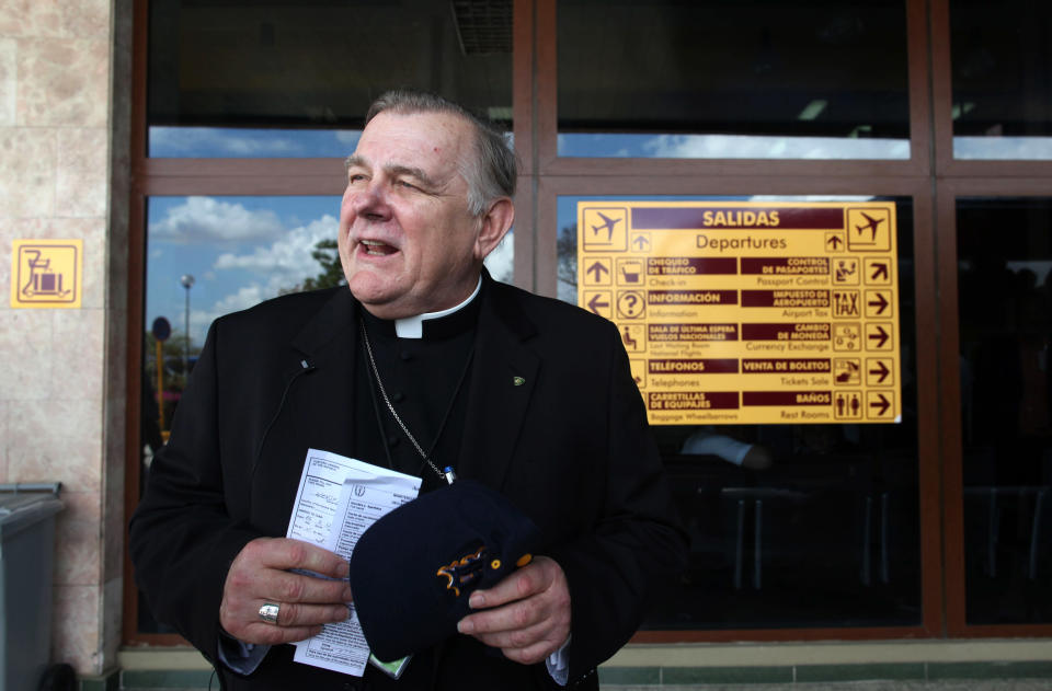 Archbishop of Miami Thomas Wenski is seen at his arrival leading a group of more than 300 Cuban-American and other pilgrims in Santiago de Cuba, Cuba, Monday March 26, 2012. Many in the group have not been back to the island since their families fled more than half a century ago.(AP Photo/Esteban Felix)