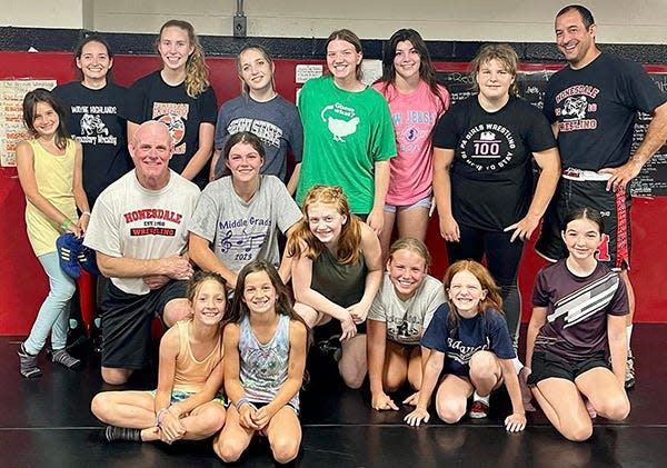 Honesdale hosted its inaugural Open House for girls wrestling this past week at the high school. Local grapplers grades 4-12 attended the event, which took place over the course of three days. Pictured here are (front, from left): Maeson Olver and Perry Olver. Kneeling are: Coach Chris Carroll, Madison Miller, Willow McDonnell, Emmy Wolfenberg, Twilla McDonnell, Nedelya Samson. Standing are: Emerson Olver, Stacey Olver, Allison Billard, Saige Olver, Jillian Penn, Sydney Roberts, Jaidyn Mikulak, Coach Ryacn Chulada.