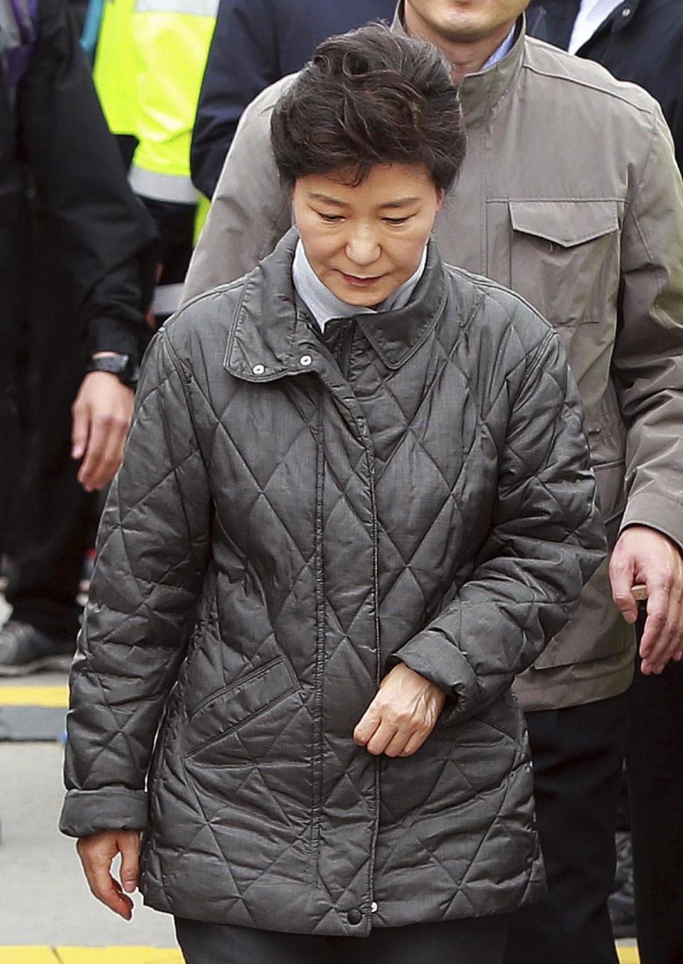 South Korean President Park Geun-hye leaves after meeting with relatives of passengers aboard the sunken ferry Sewol at a port in Jindo, South Korea, Sunday, May 4, 2014. Divers battled strong currents and wind Saturday to search unopened rooms in the sunken South Korean ferry for dozens of missing passengers, officials said Saturday. (AP Photo/Yonhap) KOREA OUT