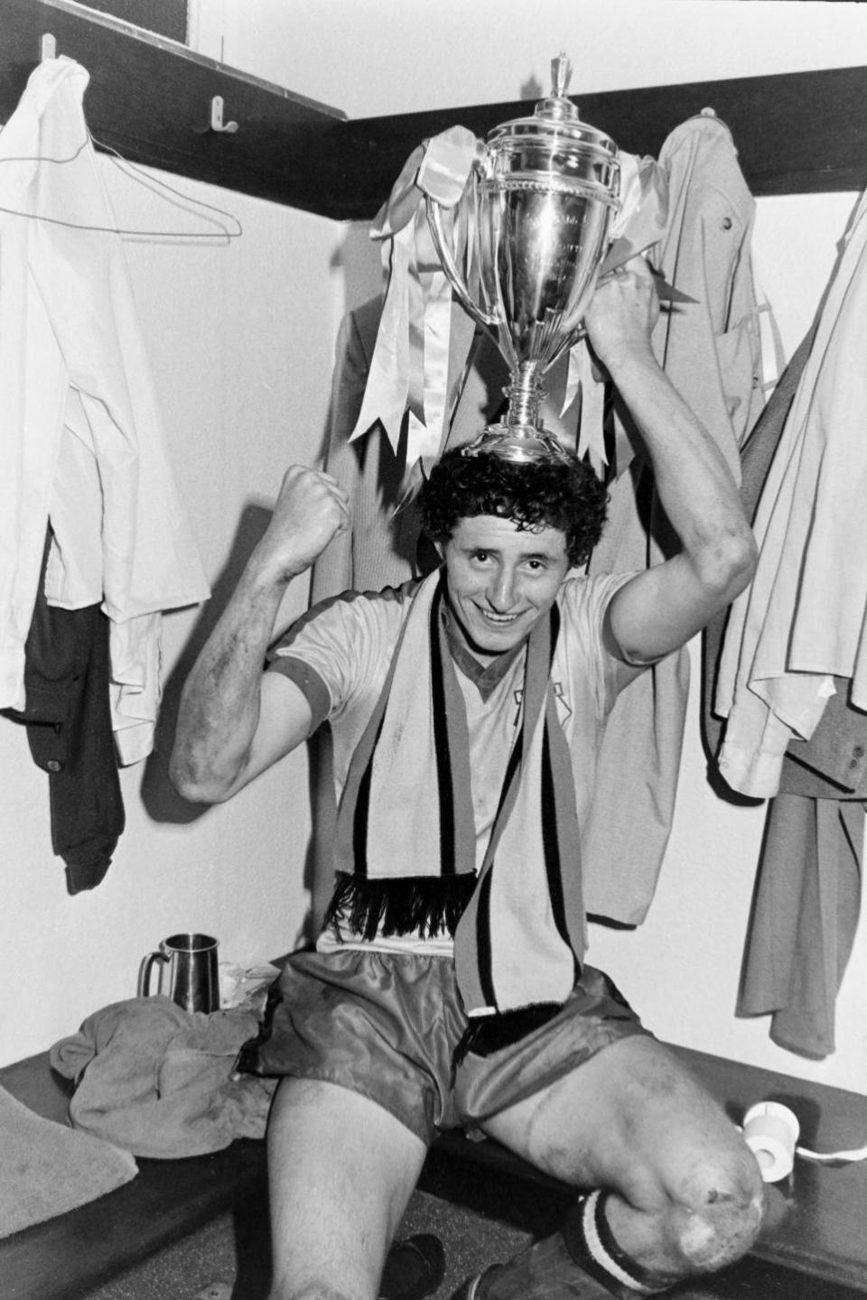 Watford Observer: Jimmy Gilligan holds the cup on his head after scoring the decisive goal