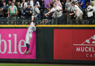 New York Yankees right fielder Aaron Judge makes a catch at the fence on a long ball from Seattle Mariners' Teoscar Hernandez during the eighth inning of a baseball game Monday, May 29, 2023, in Seattle. (AP Photo/Lindsey Wasson)