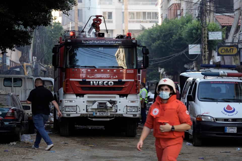 Rescuers at the scene the day after the Israeli missile strike in Saturda in Beirut (Copyright 2024 The Associated Press. All rights reserved)