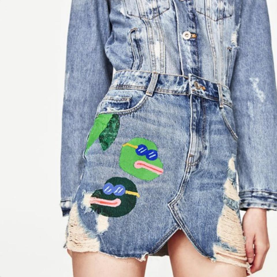 The cartoons on this skirt by Zara bear a striking resemblance to Pepe the Frog, a meme that’s been adopted by the alt-right. (Photo: Courtesy of Twitter.com/meaganrosae)