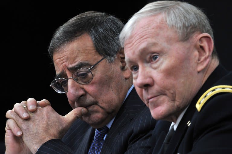 US Secretary of Defense Leon Panetta and Chairman of the Joint Chiefs of Staff General Martin E. Dempsey at a press conference January 24, 2013 at the Pentagon. The United States will have to keep up an open-ended drone war against Al-Qaeda militants in Pakistan and elsewhere to prevent another terror attack on America, Panetta said