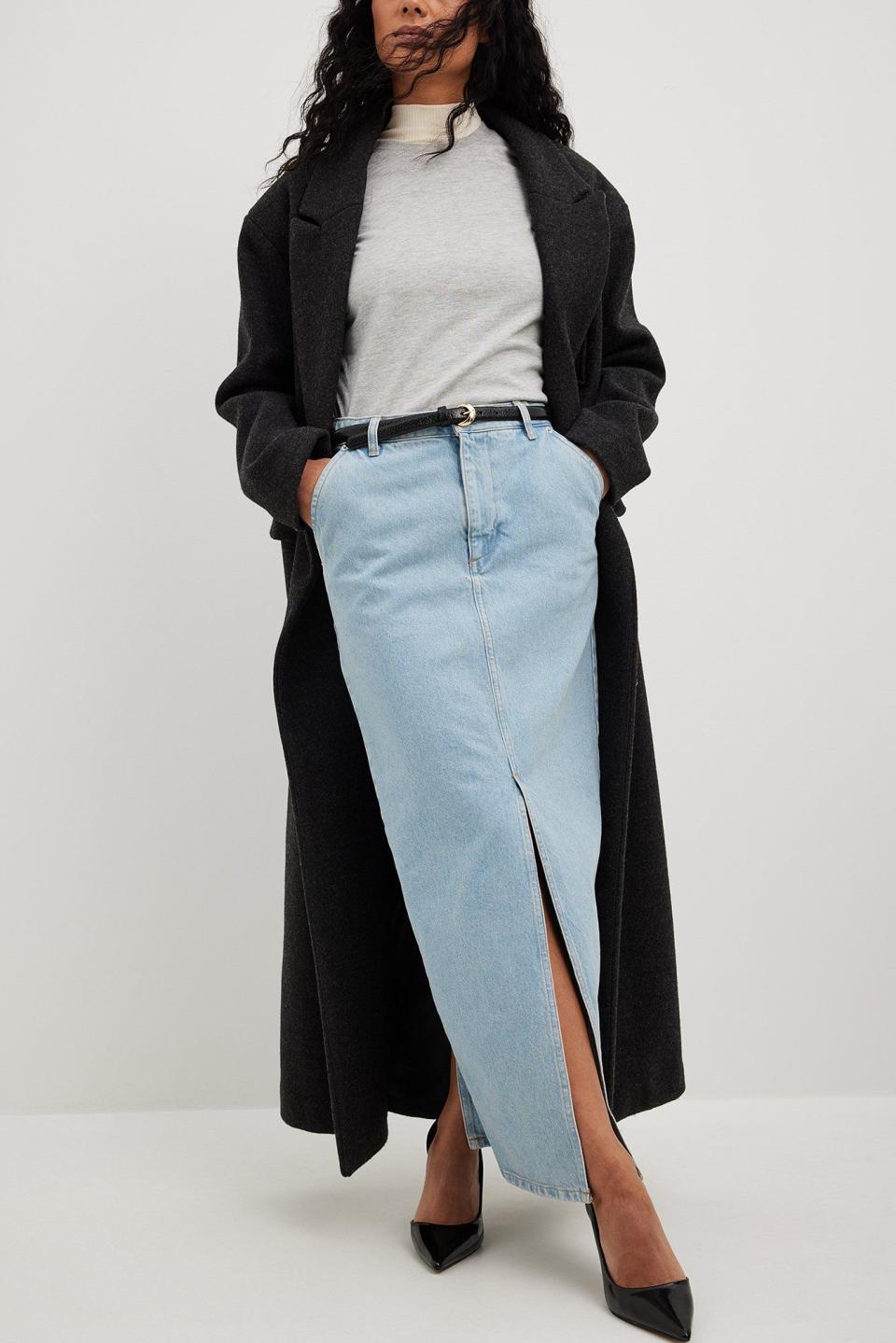 <p><a href="https://go.redirectingat.com?id=74968X1596630&url=https%3A%2F%2Fwww.na-kd.com%2Fen%2Fproducts%2Fslit-detailed--maxi-denim-skirt-blue-1018-009616-0003&sref=https%3A%2F%2Fwww.cosmopolitan.com%2Fstyle-beauty%2Ffashion%2Fa42858335%2Fnew-york-fashion-week-street-style-fall-2023%2F" rel="nofollow noopener" target="_blank" data-ylk="slk:Shop Now;elm:context_link;itc:0;sec:content-canvas" class="link ">Shop Now</a></p><p>Slit Detailed Maxi Denim Skirt Blue</p><p>$69.95</p><p>na-kd.com</p>