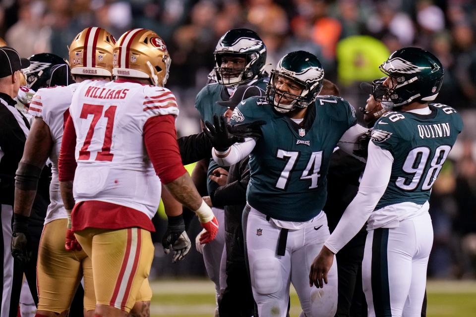 Philadelphia Eagles defensive tackle Ndamukong Suh (74) talks with San Francisco 49ers offensive tackle Trent Williams (71) during the second half of the NFC Championship NFL football game between the Philadelphia Eagles and the San Francisco 49ers on Sunday, Jan. 29, 2023, in Philadelphia.