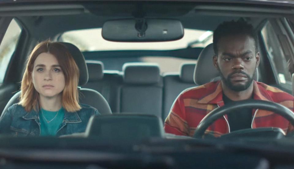 Aya Cash and William Jackson Harper look sad in a car