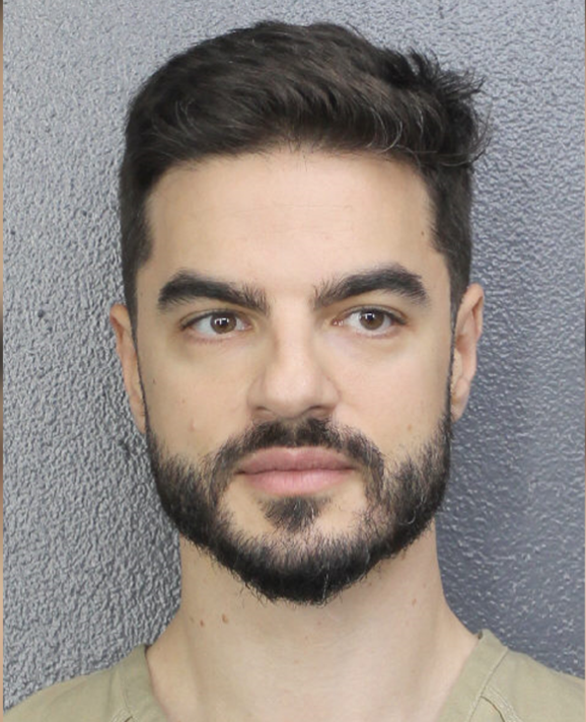 David Knezevich, 36, after his arrest by US Marshals at the Miami International Airport on 6 May in connection with his estranged wife’s disappearance in Spain (FBI handout)