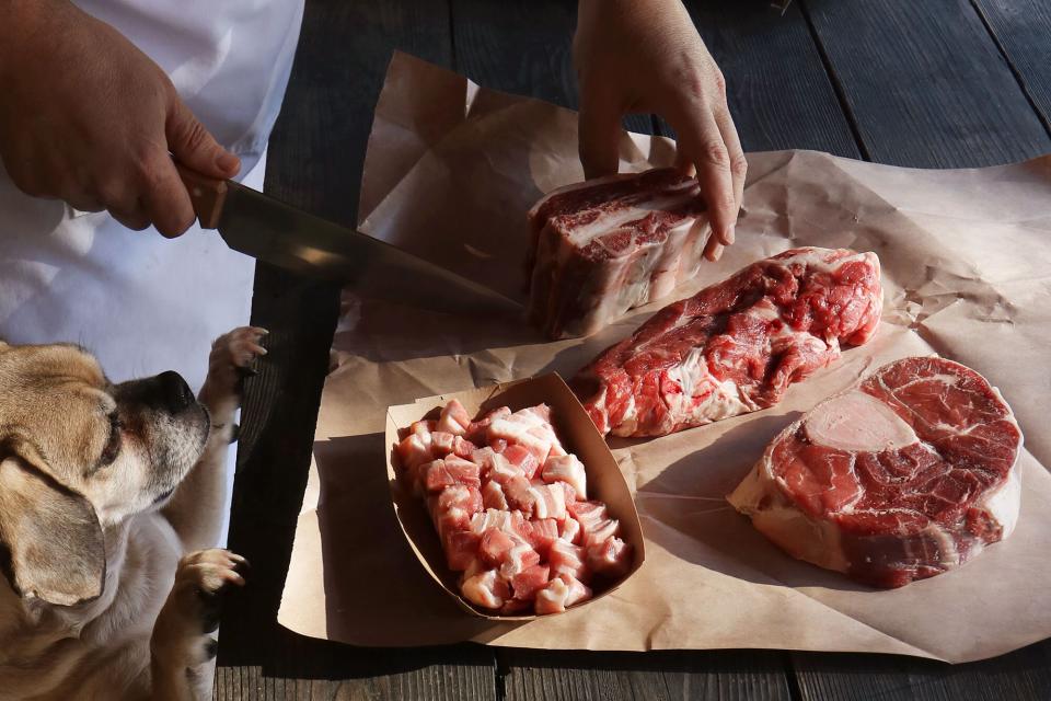 Chef preparing beef for Daube de Bouef