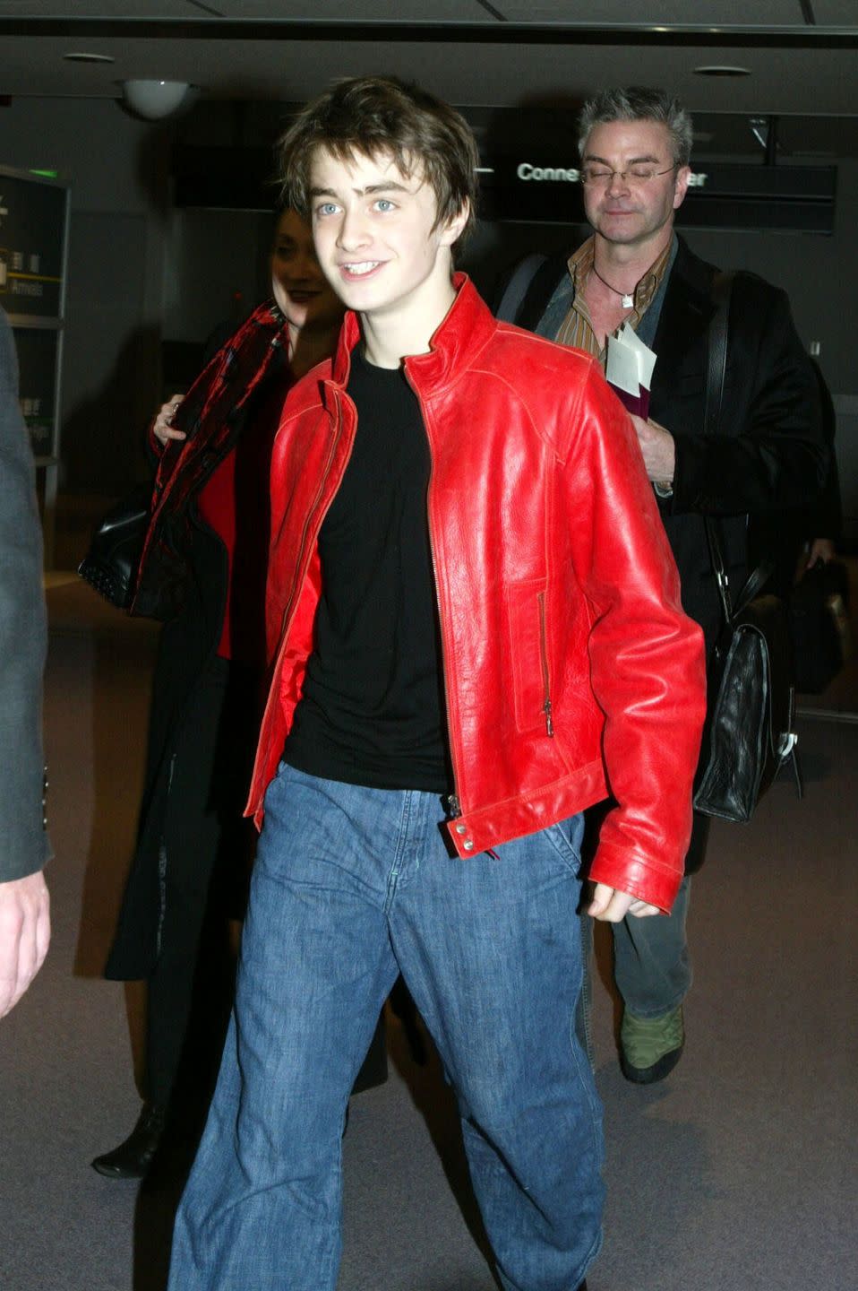 <p>Daniel Radcliffe arrives at Narita airport on December 15, 2002, to promote the second installment in the Harry Potter series, <em>Chamber of Secrets</em>. </p>