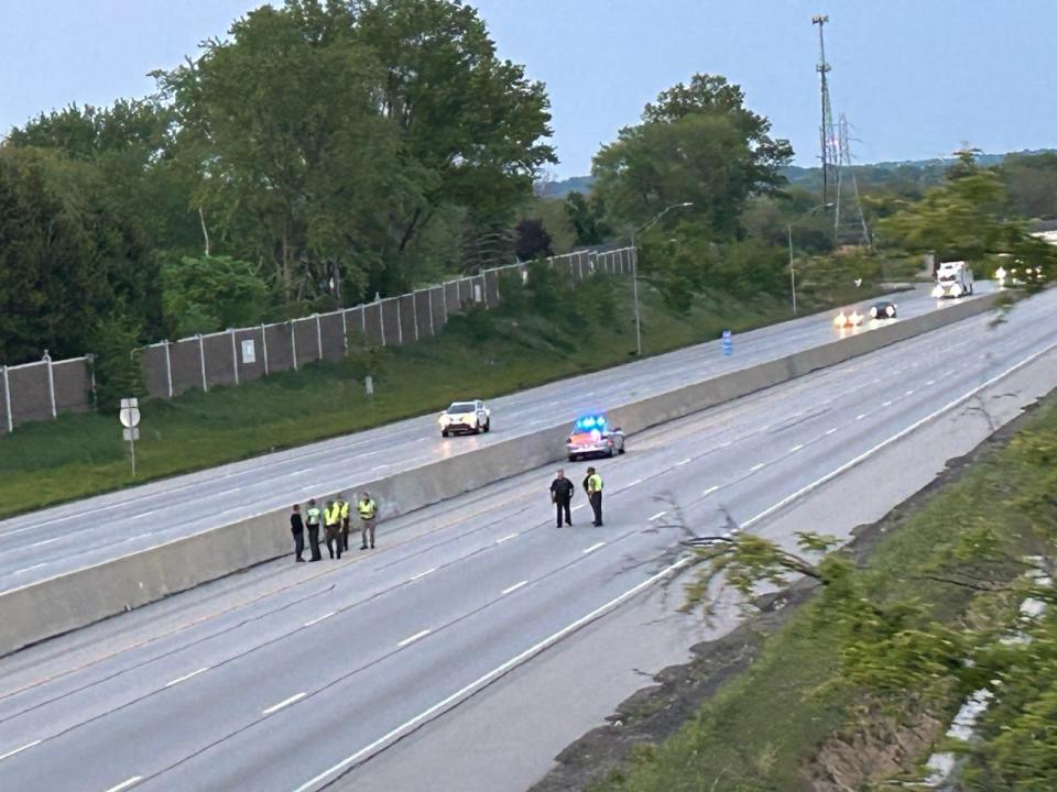 Norton police search the eastbound section of Interstate 76 May 17, 2023, after George Jensen, 40, of Akron, was shot and killed while driving.