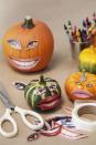 <p>Make use of the old magazine you have sitting around the house by cutting out eyes and mouths to use on your pumpkin. Simply use some craft glue to stick the faces on and voila! You've got yourself a funny pumpkin that took no time at all to make. </p><p><a class="link " href="https://www.amazon.com/ELMERS-Craftbond-Quick-Glue-E6001/dp/B00F49T7TM?tag=syn-yahoo-20&ascsubtag=%5Bartid%7C10070.g.331%5Bsrc%7Cyahoo-us" rel="nofollow noopener" target="_blank" data-ylk="slk:SHOP CRAFT GLUE;elm:context_link;itc:0;sec:content-canvas">SHOP CRAFT GLUE</a></p>