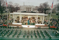 A military unit marches down Washington's Pennsylvania Avenue past the reviewing stand during the inaugural parade held after Ronald Reagan was sworn in as the nation's 40th president in Washington, D.C., Jan. 20, 1981. (AP Photo)