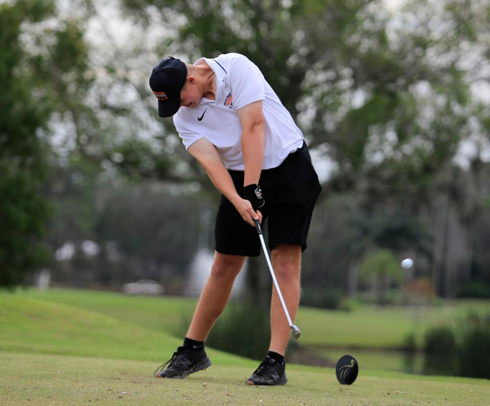 Spruce Creek's Ben Washuta tees off during the Volusia/Flagler Boys Championship on Monday, Oct. 9, 2023 at Crane Lakes in Port Orange.