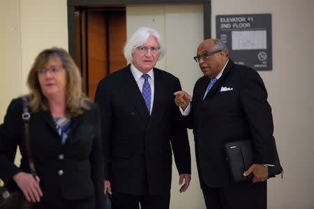 Attorney Tom Mesereau (C), attorney for Bill Cosby, arrives at the Montgomery County Courthouse for the sexual assault retrial of Bill Cosby in Norristown, Pennsylvania, U.S. April 24, 2018. Jessica Griffin/Pool via REUTERS