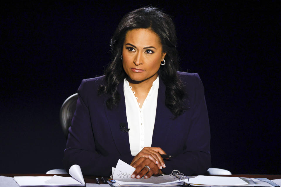 Moderator Kristen Welker of NBC News listens as President Donald Trump and Democratic presidential candidate former Vice President Joe Biden participate in the final presidential debate at Belmont University, Thursday, Oct. 22, 2020, in Nashville, Tenn. (Jim Bourg/Pool via AP)