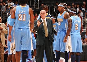 George Karl knows the Nuggets could be headed for another turbulent season if they trade Carmelo Anthony