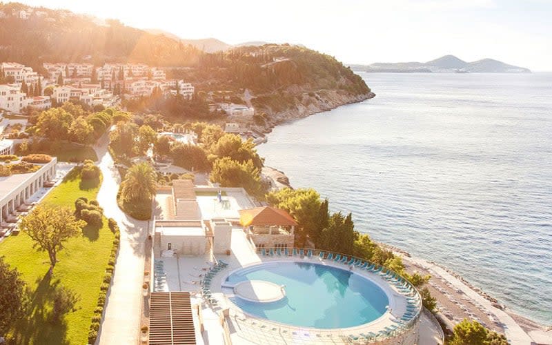 Grounds at the Radisson Blu Dubrovnik are planted with pines, palms and olive trees, and give onto a shoreline with three pools