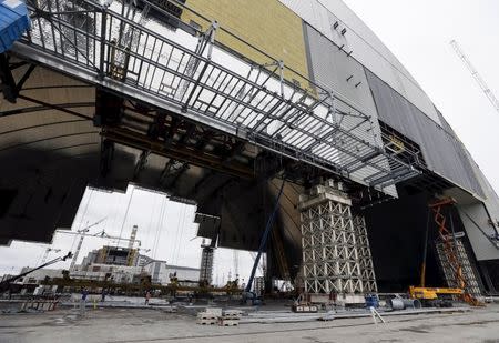 A general view shows the construction of the New Safe Confinement (NSC) structure at the site of the Chernobyl nuclear reactor, Ukraine, March 23, 2016. REUTERS/Gleb Garanich