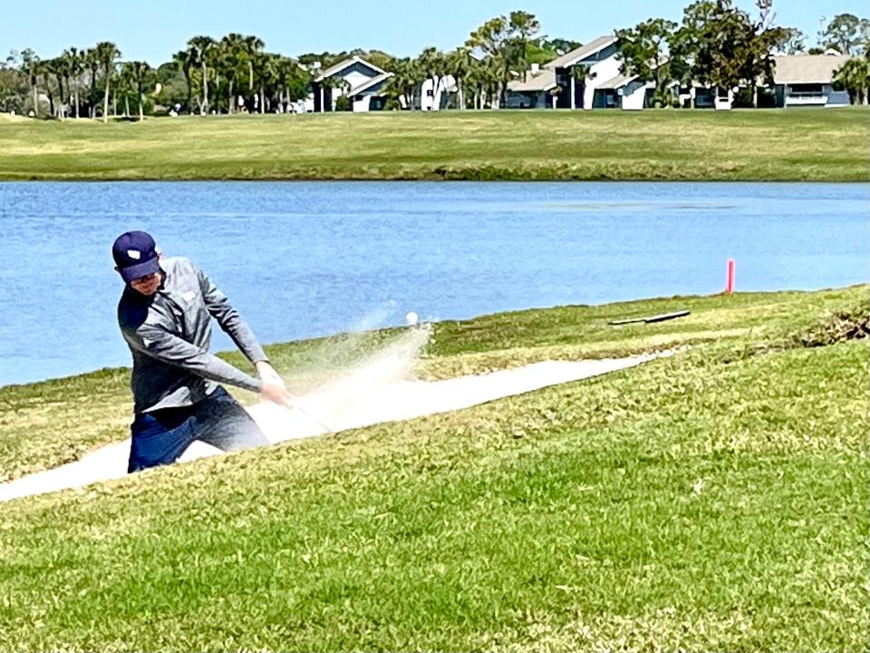 Cody Carroll of the University of North Florida hits out of one of the many bunkers at the Sawgrass Country Club during the 2022 Hayt,  college invitational. Sawgrass will be one of the venues for the 2023 PGA Tour National Qualifying Tournament.